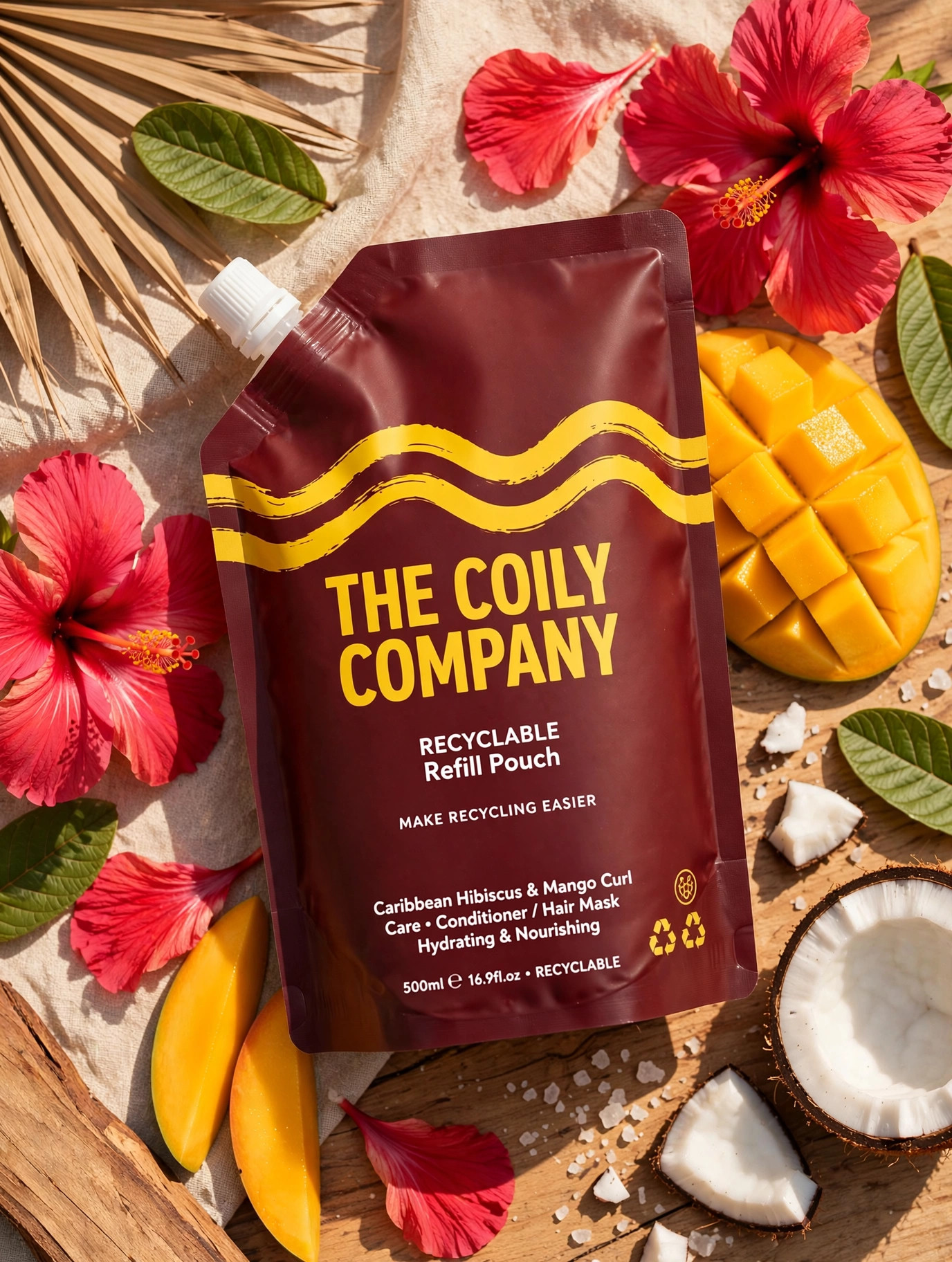 The Coiling Cream pouch with mango, hibiscus, coconut and guava
